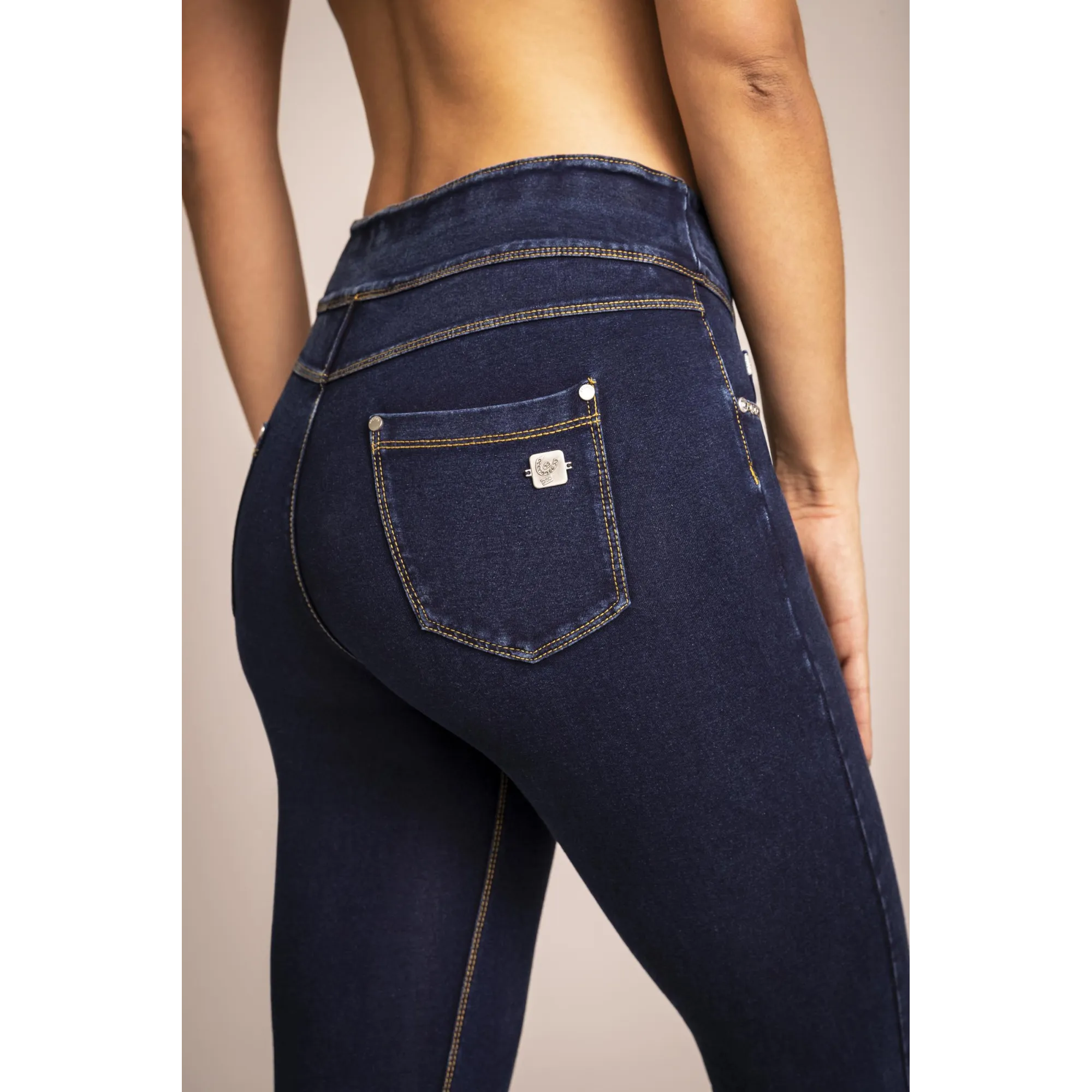 N.O.W.® Yoga - Spodnie Skinny z podwijanym pasem w kolorze niebieskim