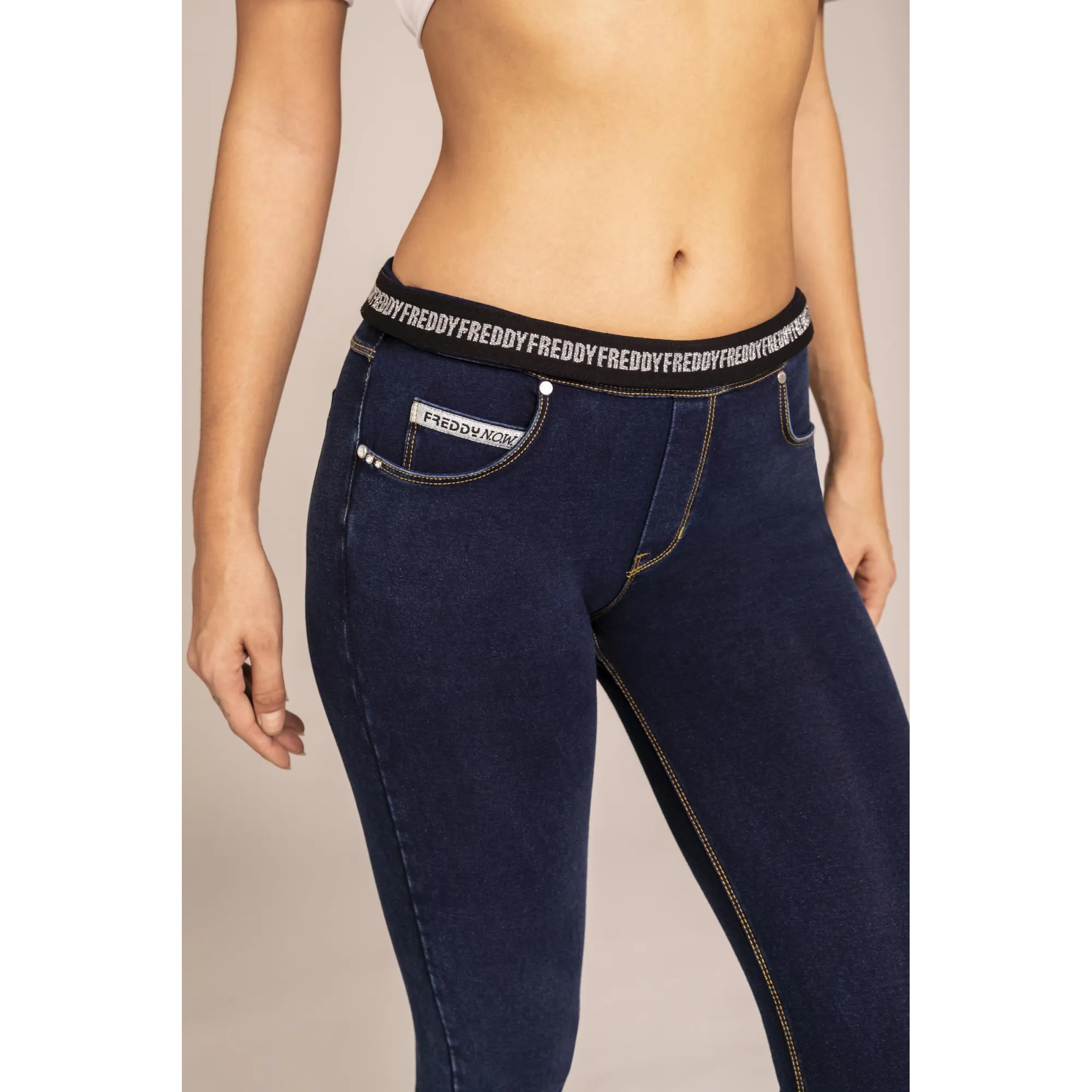 N.O.W.® Yoga - Spodnie Skinny z podwijanym pasem w kolorze niebieskim
